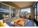Relaxing screened porch with outdoor furniture at 251 Blueberry Ln, Davenport, FL 33837