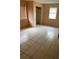 Bedroom with tile flooring and a window with blinds at 2732 Westside Dr, Leesburg, FL 34748