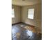 Bedroom with tile flooring and a window with blinds at 2732 Westside Dr, Leesburg, FL 34748