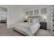 Relaxing bedroom with a comfortable bed and neutral decor at 3230 Belize Pl, Haines City, FL 33844