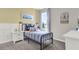 Charming bedroom with a twin bed and stylish decor at 3234 Belize Pl, Haines City, FL 33844