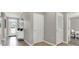 Open hallway with tile floors and neutral wall colors at 3234 Belize Pl, Haines City, FL 33844