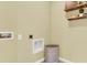 Laundry room with shelving, a hamper, and built-in storage at 3234 Belize Pl, Haines City, FL 33844