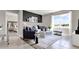 Cozy living room with sectional sofa and large window at 3234 Belize Pl, Haines City, FL 33844