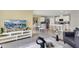 Open living space with kitchen, dining, and seating areas at 3234 Belize Pl, Haines City, FL 33844