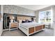 Spacious main bedroom with a stylish bed and large window at 3234 Belize Pl, Haines City, FL 33844