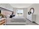 Main bedroom with ample space, large window, and stylish decor at 3234 Belize Pl, Haines City, FL 33844