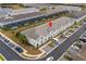 Aerial view of the house and surrounding community at 7424 Oakmoss Loop, Davenport, FL 33837