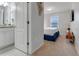 Bedroom with king bed and ensuite bathroom at 7424 Oakmoss Loop, Davenport, FL 33837