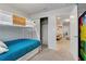 Bedroom with bunk beds and access to bath at 7424 Oakmoss Loop, Davenport, FL 33837
