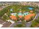 Aerial view of community pool and clubhouse at 7424 Oakmoss Loop, Davenport, FL 33837