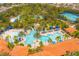 Aerial view of community pool and surrounding area at 7424 Oakmoss Loop, Davenport, FL 33837