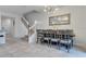 Formal dining room with a six-person table at 7424 Oakmoss Loop, Davenport, FL 33837
