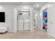 Upstairs laundry room with washer and dryer at 7424 Oakmoss Loop, Davenport, FL 33837