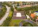 Aerial view of community sand volleyball court at 7424 Oakmoss Loop, Davenport, FL 33837