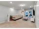 Upstairs sitting area with sofa and TV at 7424 Oakmoss Loop, Davenport, FL 33837