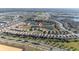 Aerial view showing home location near a lake at 8990 Ace Loop, Davenport, FL 33896