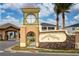 ChampionsGate community entrance with signage and landscaping at 8990 Ace Loop, Davenport, FL 33896
