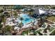 Resort-style pool area with cabanas and mini golf at 8990 Ace Loop, Davenport, FL 33896