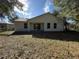 Newly built home with covered patio and backyard at 911 Pine Ave, Mount Dora, FL 32757