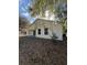 Newly built home with covered patio and backyard at 911 Pine Ave, Mount Dora, FL 32757