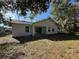 Newly built home with covered patio at 911 Pine Ave, Mount Dora, FL 32757