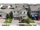 Two-story house with gray roof, two-car garage, and solar panels at 9529 Nautique Ln, Winter Garden, FL 34787