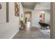 Bright and spacious entryway with tile floors and modern wall decor at 1012 Sadie Ridge Rd, Clermont, FL 34715