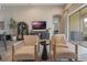 Relaxing living space featuring two armchairs and a large TV at 1012 Sadie Ridge Rd, Clermont, FL 34715