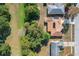 Aerial view of a house with solar panels and a large backyard at 117 Red Rose Cir, Orlando, FL 32835