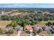 Aerial view of house and surrounding neighborhood at 117 Red Rose Cir, Orlando, FL 32835