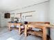 Large workshop with extensive workbench and tools at 117 Red Rose Cir, Orlando, FL 32835