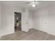 Spacious bedroom with hardwood floors and access to living room at 1309 E Parker St, Lakeland, FL 33801