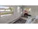 Sunroom featuring a comfortable sofa and large windows at 1309 E Parker St, Lakeland, FL 33801