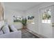 Sunroom with comfy seating and plenty of natural light at 1309 E Parker St, Lakeland, FL 33801