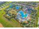 Resort-style amenities including pool, waterslides, mini golf, and expansive green areas at 1636 Moon Valley Dr, Davenport, FL 33896