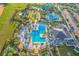 Community pool and recreation area with large pool, lounge chairs, and clubhouse at 1636 Moon Valley Dr, Davenport, FL 33896