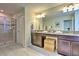 Double vanity bathroom with shower and separate tub at 1636 Moon Valley Dr, Davenport, FL 33896