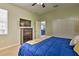 Comfortable guest bedroom with a double bed and built-in dresser at 1636 Moon Valley Dr, Davenport, FL 33896