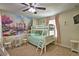 Bunk beds, castle mural, and pastel-colored bedding at 1636 Moon Valley Dr, Davenport, FL 33896