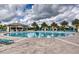 Large community pool with a swim-up bar at 1636 Moon Valley Dr, Davenport, FL 33896