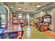 Community game room with air hockey and arcade games at 1636 Moon Valley Dr, Davenport, FL 33896