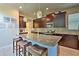 Modern kitchen with granite counters and stainless steel appliances at 1636 Moon Valley Dr, Davenport, FL 33896