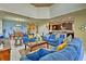 Spacious living room with comfortable seating and high ceilings at 1636 Moon Valley Dr, Davenport, FL 33896