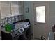 Laundry room with washer, dryer, and extra cabinets at 1648 Emerald Green Ct # 1, Deltona, FL 32725