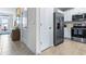 Modern kitchen with stainless steel appliances and white cabinets at 2385 Penguin Blvd, Davenport, FL 33837