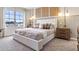 Main bedroom with a king-size bed, neutral color palette, and natural light at 2385 Penguin Blvd, Davenport, FL 33837