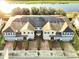 Aerial view of townhomes near water at 2766 White Isle Ln, Orlando, FL 32825