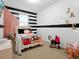 Charming bedroom with Hello Kitty decor and a playful atmosphere at 2766 White Isle Ln, Orlando, FL 32825