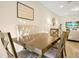Dining room with a wood table and chairs, offering ample space at 2766 White Isle Ln, Orlando, FL 32825